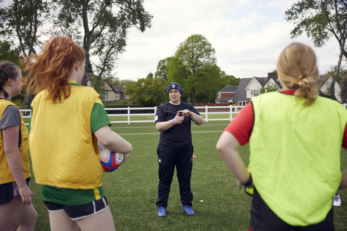 Rugby coaching — Terangi coaching players on the training pitch